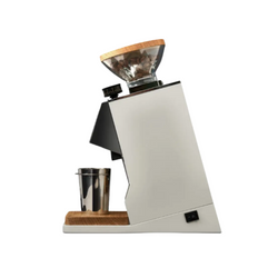 Eureka Oro Mignon coffee grinder with a white base and wooden accents