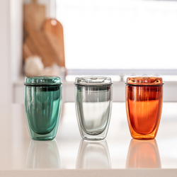Coloured coffee cups with lids