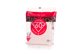 A pack of V60 coffee filter papers, labeled for 1-2 cup sizes, with a total of 100 pack quantity.