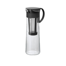 A tall, slender, clear Japanese Mizudashi cold brew coffee maker with a black lid and handle, designed to make cold brew coffee.