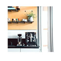 IZZO ViviPID2 espresso machine next to a coffee grinder