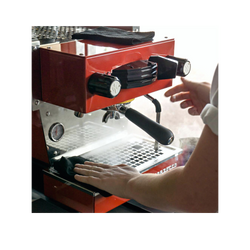 Red La Marzocco Linea Mini espresso machine in use