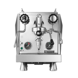 A silver Rocket Espresso Giotto Cronometro R espresso machine with a visible grouphead, temperature gauges, and adjustment knobs.