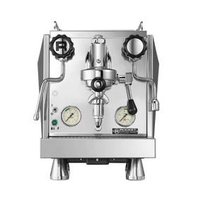 A silver Rocket Espresso Giotto Cronometro V espresso machine with pressure gauges, steam wand, and a portafilter.